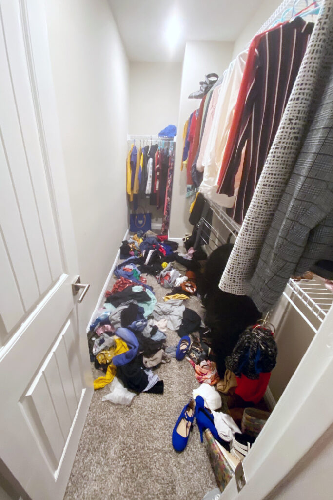 messy closet with clothes on the floor of a lazy wife